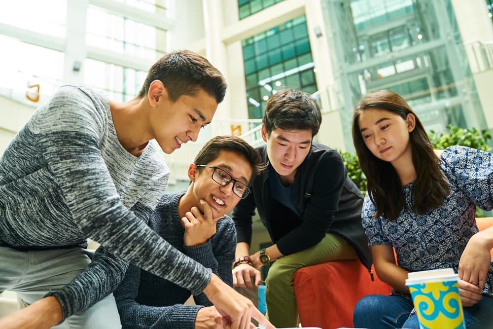 Students on the Q App platform